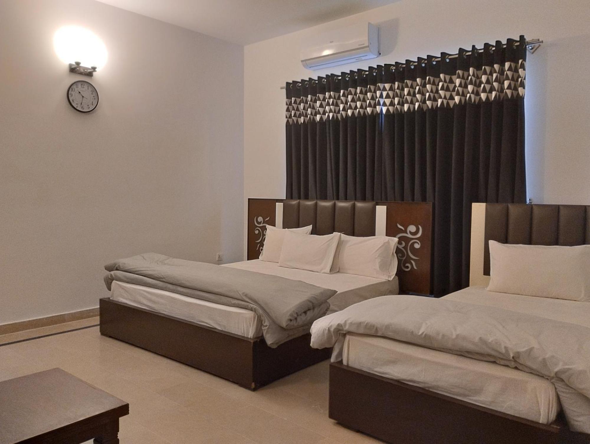 Islamabad Travelodge Guest House חדר תמונה